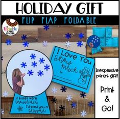 a blue and white holiday gift with snowflakes