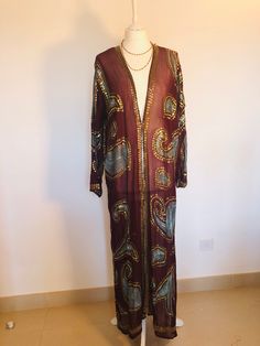 "A Beautiful Kimono Jacket,Robe . Long,light,sequinned and floaty ; A Perfect Cover Up for Holidays , Weddings and Parties. This has been Handmade from a Vintage Indian Sari.... so is completely Unique and Sustainable. A Wonderfully Chic,Aubergine Silk Chiffon,Embellished all over with Lovely Duck Egg embroidery, and 1000's of Glittering Gold and Iridescent Sequins,. One Size S M L UK size 8 to 16 US 6 to 12 European 36 to 44, The length is 135 cm / 53 \". The sleeves are 55 cm / 21.5 \". This B Egg Embroidery, Party Jacket, Beautiful Kimono, Party Jackets, Unique Jackets, Hippy Chic, Summer Kimono, Boho Party, Cocktail Jacket