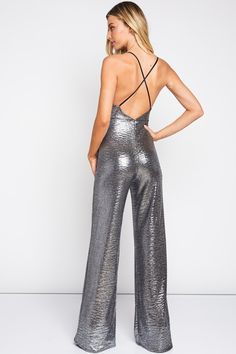 Are You Ready for a shitload of attention???Metallic silver glitter jumpsuit is ready for you to rock any room. poly/rayon Criss-Cross back and that glittery shine is unforgettable, funky, sophisticated!! Sequin Backless Jumpsuits And Rompers For Party Season, Party Season Sequined Jumpsuits And Rompers, Sequin Jumpsuits And Rompers For Party, Chic Sequined Jumpsuits And Rompers For Gala, Metallic Sequined Jumpsuits And Rompers For Night Out, Metallic Sequined Jumpsuits And Rompers For Party Season, Disco Style Jumpsuits And Rompers For Party Season, Sequin Strapless Jumpsuit For Party, Sequin Strapless Sleeveless Jumpsuit For Party