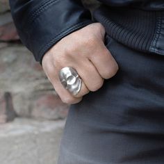 One of the most unique takes on the rocker / biker inspired skull ring. Sterling silver. Brushed finish. Each one is meticulously handcrafted for a distinct, one-of-a-kind look. - Solid .925 sterling silver- Oxidized matte finish- Available in sizes 7-12 US (O-Y UK)- Handcrafted in the USA Snake Bones, Skull Wedding Ring, Skull Engagement Ring, Skull Wedding, Diamond Eyes, Skull Pendant, Snake Ring, Skull Ring, Jewelry Inspo