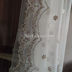 Beautiful embroidered dupatta with scallop border. Perfect for your wedding veil. It is very rich and classy dupatta. More dupatta here in our collection https://www.etsy.com/shop/neelcreations/?section_id=15880219 This Bridal Dupatta is embroidered on net with beautiful Scallop border. This can be your wedding dress chunni for Indian occasion wear for festival. This has perfect bling for you to look classy and ethnic at same time. NOTE : There might be slight color variation due to different co Traditional Nida Dupatta With Intricate Embroidery, Gold Dupatta With Chikankari Embroidery For Reception, Nida Dupatta For Reception And Diwali, Embroidered Nida Dupatta For Reception, Intricate Embroidery Nida Dupatta For Reception, Reception Nida Dupatta With Zari Work, White Chanderi Dupatta For Reception, Elegant Dupatta With Intricate Embroidery In Nida, Reception Embroidered Nida Dupatta