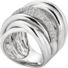 As you search for the perfect gift for your significant other, let us introduce you to the Oro Wave Ring in White Gold by Piranesi. This breathtaking piece of fine jewelry features a stunning 0.96 carat round diamond set in 18K white gold. The wave-like design of the band adds a touch of elegance and grace to the already magnificent diamond centerpiece.With its unique and captivating design, the Oro Wave Ring is sure to turn heads and garner compliments wherever it's worn. The quality and crafts Round Diamond Ring Settings, Diamond Centerpiece, Round Diamond Setting, Round Diamond Ring, Surprise Proposal, Wave Ring, Diamond Ring Settings, Diamond Set, Significant Other