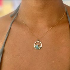 A plastic-y spin on the popular wave necklace! The Biscayne Bay Necklace elevates your style while championing sustainability. This unique piece blends ocean-inspired design and eco-consciousness. The pendant's wave shape is filled with a mosaic of upcycled microplastics. Suspended from a sterling silver chain, the necklace rests comfortably against your skin, serving as a tangible commitment to a cleaner planet. Along with looking beautiful, it's a conversation starter, a symbol of change, and Cheap Green Ocean-inspired Jewelry, Symbol Of Change, Ocean Outfits, Wave Jewelry, Ocean Inspired Jewelry, Ocean Necklace, Beach Stuff, Wave Necklace, Ocean Jewelry