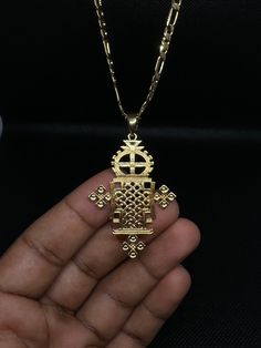 A very Beautiful Handmade Ethiopian Orthodox Church Cross Pendant. Particularly among Ethiopia Orthodox Church followers to wear a cross implied to be protected by the God as well as to show they're devoted Christian. Dimensions: 1.77" (45.2mm)  - Height 1.25" (31.75 mm) - width Ethiopian Orthodox Church, Orthodox Church, Christian Cross, Christian Jewelry, Red Green Yellow, Red Stripe, Ethnic Jewelry, Christian Art, Ethiopia