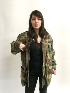 Classic camo army jacket in a midweight. Easy, goes with everything casual cotton coat. Nicely broken in and worn. Best fits S/MMeasurements:Shoulders: 18.5inBust: 20.5inWaist: 20inHips: 22inLength: 29.5inSleeve length: 23.5in Combat Style Outerwear With Multiple Pockets For Fall, Fall Combat Outerwear With Multiple Pockets, Oversized Military Cotton Utility Jacket, Khaki Combat Outerwear For Fall, Military Cargo Style Utility Jacket For Winter, Fall Combat Utility Jacket With Cargo Pockets, Winter Military Cargo Style Utility Jacket, Combat Style Utility Jacket With Long Sleeves For Fall, Combat Style Long Sleeve Utility Jacket For Fall