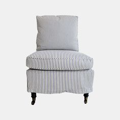 a blue and white striped chair with black legs