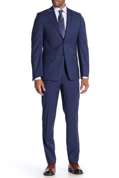 A signature pair of wool twill pants cut in a skinny fit are perfect for a polished and professional look at the office. Fit: this style fits true to size.- Skinny fit - Zip fly with button and hook-and-bar closure- Side slash pockets- Back besom pockets- Wool blend construction- Approx. 10.5" rise, 32" inseam (size 32x32)- Imported Modern Fitted Dress Pants For Office, Modern Tailored Dress Pants For Formal Occasions, Modern Formal Dress Pants With Welt Pockets, Modern Business Dress Pants, Modern Fitted Dress Pants For Business Casual, Wool Business Suit With Straight Pants, Tailored Modern Dress Pants For Business, Modern Fitted Calvin Klein Bottoms, Modern Tailored Dress Pants For Business