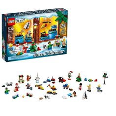 the lego city christmas set is in its box and it's contents are all laid out