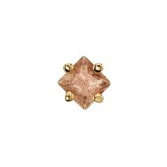 an image of a gold ring with pink stones