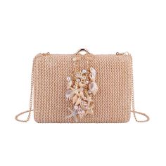 Dive into summer elegance with our Raffia Clutch featuring assorted seashell accents and a stylish chain crossbody strap. This beach-inspired accessory combines the natural charm of raffia with the whimsy of assorted seashells, creating a unique and fashionable statement piece. The chic chain crossbody strap adds a touch of modern flair, making it a versatile companion for both casual outings and special occasions. Embrace the coastal vibes and elevate your style with this one-of-a-kind clutch, Summer Beach Bags Made Of Shell, Beige Chain Strap Beach Bag, Chic Gold Straw Bag, Chic Beige Straw Bag As Gift, Chic Beige Straw Bag For Gift, Summer Beach Beaded Straw Bag, Summer Vacation Beaded Straw Bag, Rectangular Straw Bag With Chain Strap For Vacation, Elegant Summer Beach Bags