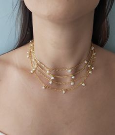 14k gold,Tiny pearl choker, Bridal choker,Waterpearl choker,Bridesmaid choker,Pearl necklace, Tiny pearl choker,Special chain choker 14 k gold plated chains Tiny waterpearl 14 k gold plated lobster claps Gold Pearl Choker With Clavicle Chain, Gold Pearl Clavicle Chain Choker, Gold Delicate Chain Pearl Choker, Gold Pearl Choker With Delicate Chain, Gold Pearl Choker Necklace With Delicate Chain, Gold Pearl Embellished Choker Necklace, Minimalist Gold Pearl Choker, Delicate Gold Bridal Necklace With Pearl Chain, Dainty Gold Bridal Necklace With Pearl Drop