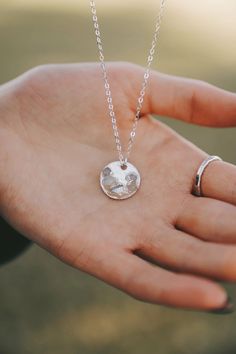 I am Loved Necklace · Rose Quartz, Moonstone, Diamond Quartz Crystals chosen to match the colors of my wedding, and hours of love poured into each individual piece. Make the perfect set with a matching necklace, earrings, and a ring. Neutral and feminine color palette, with a minimalist design. Beautiful meaning in what the stones represent: • Rose Quartz is the stone for unconditional love. • Moonstone is the stone for new beginnings; represents inner growth, strength, and calmness. • Quartz is the stone that represents clarity; clarity of mind and clearing away negativity. Highest quality solid sterling silver, rose gold filled, or gold filled chains. Chain is 15 inches + 3 inch extender. Necklace is flat so the weight of it is super light, you won't even notice you're wearing it. Ready White Moon Phase Necklace For Wedding, Dainty Heart Pendant Jewelry With Birth Flower, Sterling Silver Moon Charm Jewelry For Mother's Day, Sterling Silver Jewelry With Moon Charm For Mother's Day, Fine Jewelry With Moon Charm For Wedding, Elegant Moon Charm Jewelry For Anniversary, Elegant Moon Charm Jewelry Gift For Her, Silver Pendant Necklace For Anniversary, Silver Pendant Necklace For Anniversary Gift