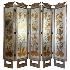 four - panel screen with flowers and birds painted on the sides, in gold foil