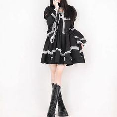 𝔇𝔢𝔱𝔞𝔦𝔩𝔰: Style: Darkwear, Goth Lolita, Kawaii Goth Material: Polyester & Cotton 'Holy Doll' is a features a heart shape hollow-out, lace details, and removable sleeves. It is cute and creepy. Super comfy materials, feel stretchable and soft Get free shipping with a purchase of over 80$ at our store SIZE WAIST LENGTH SHOULDER CHEST SLEEVES 27 in 32 in 7 in 34 in 7 inM 28 in 32 in 7 in 35 in 7 inL 30 in 33 in 8 in 37 in 8 inXL 31 in 33 in 8 in 39 in 8 inItem measured by hands may have 1-2 i Black Gothic Dress With Doll Collar, Gothic Black Dress With Doll Collar, Black Harajuku Dress For Alternative Fashion, Black Gothic Mini Dress With Lace Trim, Black Long Sleeve Harajuku Dress, Harajuku Style Black Mini Dress, Black Emo Mini Dress, Black Long Sleeve Emo Dress, Black Mini Length Emo Dress