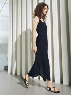 This is a casual and feminine dress by ouel that is made out of high quality and sturdy material. With distinctive mood of the design and comfortable wear, you can style it for your casual daily outfit.- Irregular hem length- Adjustable shirring with side string detail- Casual and feminine trendy mood Casual Viscose Maxi Dress For Evening, Casual Evening Maxi Dress In Viscose, Chic Asymmetrical Hem Flowy Midi Dress, Chic Flowy Midi Dress With Asymmetrical Hem, Chic Flowy Asymmetrical Dress, Casual Midi Dress With Asymmetrical Hem For Evening, Casual Midi Dress With High-low Hem For Evening, Casual Maxi Dress With Asymmetrical Hem For Night Out, Summer Workwear Dress With Asymmetrical Skirt