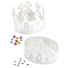 two plastic crowns with different colored candies in front of them on a white background