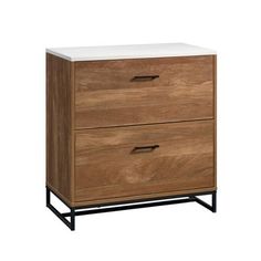 the two drawers are made from wood and have white marble top tops on each drawer