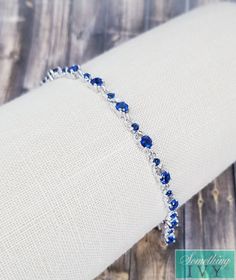 ❤Shop with us online at - https://SomethingIvy.com/❤ Something Blue Bracelet - Sapphire Blue Bracelet - Silver/Blue Bracelets - Wedding Bracelet - Royal Blue Crystal Bracelet Matching necklace - https://www.etsy.com/listing/785385383/fast-ship-sapphire-blue-necklace-royal Matching Earrings available for all bracelet colors, see the earrings section Sign up for promotions here - https://somethingivy.com/pages/promo-sign-up Lovely bracelet, available in Bulk for Bridesmaids Orders or Pageants, ple Royal Blue And Silver Jewelry, Silver And Blue Bracelet, Elegant Adjustable Blue Crystal Bracelet, Adjustable Sapphire Bracelets For Wedding, Blue Bangle Bracelets For Wedding, Blue Bangle Bracelet For Wedding, Adjustable Blue Bracelet For Formal Occasions, Blue Jubilee Bracelet Jewelry For Wedding, Adjustable Blue Crystal Bracelet For Wedding