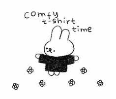 a drawing of a white rabbit holding a black shirt with the words comfy t - shirt time on it