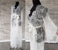 Off-white luxurious wedding robe, to add a perfect touch to your perfect and unique day. Only high quality fabrics and high finishing used for making the robe as neat as it can be. Please find the wedding robes collection here https://www.etsy.com/shop/LidiasBoutiqueDesign?ref=seller-platform-mcnav&section_id=25023222. For wedding dresses, please access https://www.etsy.com/shop/LidiasBoutiqueDesign?ref=seller-platform-mcnav§ion_id=23157290. For wedding tops and boleros, please access https: Sheer Lace Wedding Night Gown, Elegant Lace Gown For Wedding Night, Feminine Lace Wedding Robe, Long Lace Robe For Wedding Night, Elegant Lace Bridal Gown, Elegant Bridal Lace Gown, White Lace Wedding Nightgown, Lace Patchwork Gown For Wedding Night, White Lace Nightgown For Wedding