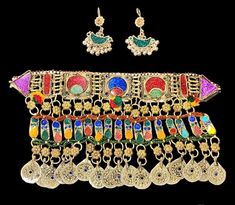 Afghan traditional Kuchi style jewelry including necklace and earing. Bohemian Jewelry With Traditional Patterns As Gift, Traditional Multicolor Necklace With Traditional Patterns, Bohemian Jewelry For Ceremonial Festival, Bohemian Festival Jewelry For Ceremonial Occasions, Traditional Decorative Wedding Jewelry, Traditional Decorative Jewelry, Bohemian Jewelry With Traditional Patterns For Festivals, Bohemian Festival Jewelry With Traditional Patterns, Traditional Festive Jewelry With Matching Earrings