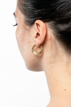 Shaped like a crescent moon, the Moon Hoops are reminiscent of ancient flat, disc-like medallions with ridges representing rays of light. - Stainless Steel Post- Brass plated in 14k Gold or Sterling Silver- Made in Los Angeles | Small Moon Hoop Earrings for Women in Gold Woman In Gold, Rays Of Light, Hoop Earrings Style, Steel Post, Silver Hoop Earrings, Women Accessories Jewelry, Crescent Moon, Earrings For Women, Crescent