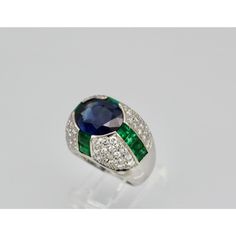 1990s Bulgari Trombino Sapphire Emerald Diamond Ring Size 5.75 | Chairish Luxury Oval Multi-stone Diamond Ring, Luxury Oval Sapphire Ring With Pave Setting, Formal Sapphire Ring With Pave Setting, Elegant Sapphire Signet Ring, Elegant Sapphire Gemstone Signet Ring, Elegant Sapphire Signet Ring With Gemstone, Formal Round Emerald Ring With Pave Setting, Luxury Emerald-cut Sapphire Ring With 17 Jewels, Formal Round Sapphire Ring With Pave Setting