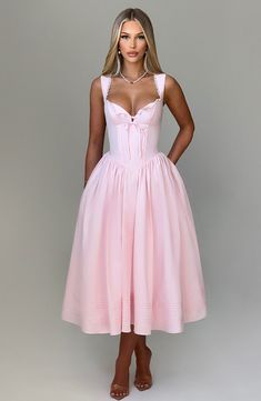 Put a pretty twist on your next bridal look with Marlena, our dreamy blush midi made with a super snatched waist and full, voluminous skirt. Crafted in our premium cotton-blend fabric with all-over floral print, this square neck design is complete with pintuck, lace trim and button details and a lace up back for your perfect fit. Paired with soft waves, glowing makeup and statement earrings, make all the memories in Marlena. 



Colour: Blush.

Premium non-stretch cotton blend fabric.

Fully lin Homecoming Dresses Corset, Square Neck Design, White Dress Spring, Midi Dress Wedding Guest, Snatched Waist, Voluminous Skirt, Dresses Flowy, Maxi Dress Sale, Glowing Makeup