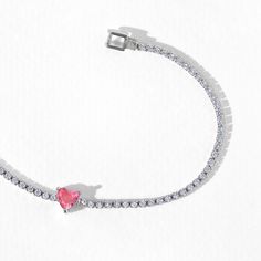 A modern twist on a timeless piece, this classic tennis bracelet features a gorgeous gradient of heart-shaped studs at its center. Trust us when we say that you'll be reaching for this one over and over. Heart-shaped Fine Jewelry Bracelet With Diamond Accents, Valentine's Day Anniversary Jubilee Tennis Bracelet, Elegant Heart-shaped Tennis Bracelet With Diamond Accents, Trendy Silver Cubic Zirconia Tennis Bracelet, Heart Cut Tennis Bracelet For Anniversary On Valentine's Day, Diamond Tennis Bracelet For Valentine's Day Gift, Valentine's Day Diamond Tennis Bracelet Gift, Heart Cut Tennis Bracelet With Diamond Accents For Gift, Heart Cut Tennis Bracelet With Diamond Accents As Gift