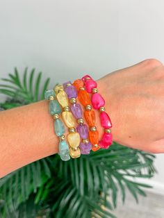 Add some color and fun to your wrist with our Chunky Bright Jewel Stack Beaded Bracelet! With its stretch stack design, it's easy to wear and will brighten up any outfit. Stack 'em high and show off your playful style! Trendy Pink Stretch Bracelet With Large Beads, Casual Hand-strung Stretch Bracelet, Trendy Plastic Beaded Bracelets For Party, Fun Beaded Stretch Bracelet For Summer, Trendy Multicolor Stretch Bracelet With Faceted Beads, Trendy Pink Stretch Bracelet With Faceted Beads, Casual Stretch Bracelet With Round Beads For Spring, Bohemian Stretch Bracelet With Colorful Beads For Spring, Trendy Stackable Beaded Bracelets