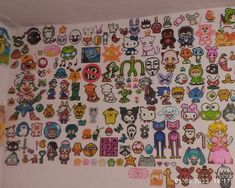 a wall covered in lots of different types of stickers