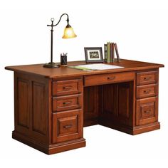 This executive panel desk is perfect for any home office. Shown in maple, but also available in other woods & stains. Order just the desk or add the hutch top as well. Available in Oak, Cherry, & Maple. This item can be customized. Available in 2 sizes. 70" x 36" or 65" x 30". This breaks down into 4 pieces for easy moving. Finished back is standard. Pencil Drawer with Pencil Tray 2 Writing Tray Pullouts 4 Divided Drawers 2 File Drawers (Letter or Legal Size) Desktop Grommet Dovetail Dra Handmade Wooden Desk, Hutch Top, Corner Desk Office, Gallery Furniture, Solid Wood Desk, Amish Furniture, Drawer Hardware, Office Set, Raised Panel