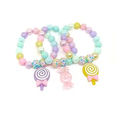 These adorable bracelets are the perfect favor for your little one's macaroon themed party! Each bracelet features a pastel resin macaroon charm, resin rhinestone beads and an assortment of pastel 10mm acrylic beads strung with durable stretch floss cord. You will receive a mix of charm colors. Each bracelet will arrive individually packaged in organza bags. Please select the number of bracelets and bracelet size needed from the drop down menu. Please message me if you have any questions. These Novelty Round Beads Bracelet For Birthday, Trendy Plastic Jewelry For Birthdays, Cute Round Beaded Bracelets For Birthday, Whimsical Adjustable Beaded Bracelets For Party, Whimsical Pastel Jewelry As Gift, Pink Novelty Stretch Bracelet For Birthday, Novelty Pink Stretch Bracelet For Birthday, Sweet Beaded Bracelets For Birthday, Sweet Round Beaded Bracelets For Birthday