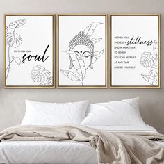 two framed art prints on the wall above a bed with white sheets and pillows in a bedroom