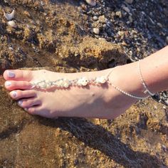 Amazing pair of Barefoot sandals, These anklets are the perfect bridal accessories for your beach wedding. These bridal beaded barefoot sandals embellished with pearls and rhinestone are a piece of absolutely stunning foot jewelry for you the boho bride on your big day🌺 This stunning pair of bridal pearl barefoot sandals will be a gorgeous addition to any wedding dress. Wearing this luxurious foot jewelry will make you feel sparkly and special on your wedding day. 💗💖 Make it unique! It's YOUR Silver Toe Ring Barefoot Sandals For Destination Wedding, Silver Anklets For Summer Destination Wedding, Silver Anklets For Destination Wedding, Silver Anklets For Destination Wedding In Summer, Adjustable Silver Anklets For Beach Wedding, Silver Beaded Anklets For Destination Wedding, Adjustable Silver Sandals For Destination Wedding, Silver Ankle Strap Barefoot Sandals For Beach, Silver Barefoot Sandals For Beach Season