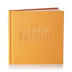 an orange book with the words true friend written on it