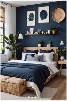 a bedroom with blue walls and white bedding, wicker baskets on the wall