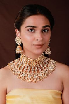 22kt matte gold plated Noor Bridal maharani chandelier necklace with Jadau kundan and pearl trinket embellishments. Comes with a pair of jhumkas. - Aza Fashions Jadau Three Piece Necklace, Chandelier Necklace, Bridal Necklace Set, Jewellery Sets, Bridal Necklace, Matte Gold, Aza Fashion, White Silver, Base Colour