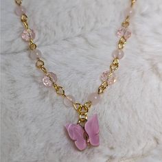 Rose Quartz And Glass Crystal Beaded Gold Choker Necklace With Pink Butterfly Charm Measures Approximately 14" And Is Finished With A Gold Toned Stainless Steel Chain With A Lobster Clasp And 1.5" Extension Chain. Trendy Pink Crystal Necklaces As Gift, Trendy Pink Crystal Necklaces For Gifts, Trendy Pink Crystal Necklace For Gift, Handmade Pink Crystal Necklaces With Round Beads, Handmade Pink Crystal Bead Necklace, Dainty Pink Beaded Necklaces For Gifts, Dainty Pink Beaded Necklace For Gift, Pink Round Beads Crystal Necklaces For Jewelry Making, Pink Crystal Necklaces With Round Beads For Gifts