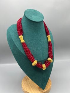 Introducing the exquisite "Nepalese Katar Gedi Hydro Potey Necklace" - a masterpiece inspired by the rich cultural heritage of Nepal. Handcrafted with love and skill by talented artisans, this necklace embodies the essence of Nepalese craftsmanship. Our company offers expedited Next-Day Delivery Services within the United Kingdom, ensuring prompt and efficient transportation of goods.  Additionally, we strive to extend our shipping capabilities to cater to customers worldwide, aiming to provide Handmade Temple Jewelry Beaded Necklaces For Festivals, Festive Handmade Ceremonial Beaded Necklace, Elegant Faceted Beads For Diwali, Handmade Beaded Necklaces For Ceremonial Festive Occasions, Festive Handmade Beaded Necklace For Ceremonial Occasions, Handmade Temple Jewelry Beaded Necklace For Diwali, Festive Ceremonial Temple Jewelry Beaded Necklaces, Traditional Festive Ceremonial Beaded Necklace, Traditional Festive Ceremonial Beaded Necklaces