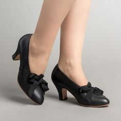 PRE-ORDER Hazel Vintage Pumps (Black)(1920-1950) – American Duchess Formal Heels With Ribbon And Round Toe, Formal Ribbon Heels With Round Toe, Formal Round Toe Heels With Ribbon, Formal Leather Kitten Heels With Bow, Formal Court Shoes With Bow And Low Heel, Formal Low Heel Court Shoes With Bow, Elegant Leather Kitten Heels With Bow, Classic Pointed Toe Formal Dance Shoes, Classic Formal Pointed Toe Dance Shoes