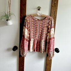 New American Eagle Blouse Bell Sleeve Boho Mixed Media Peasant Size Small Tassels Pastel Pink Gorgeous. Thought It Was From Anthropologie. Excellent Quality & Detail New Without Tags 22” Long 17” Pit To Pit Inventory Bin G Bohemian Spring Tops With Tassel Ties, Bohemian Tops With Tassel Ties For Spring, Fall Festival Bohemian Peasant Top, Bohemian Peasant Top With Boho Print, Long Sleeve Fringe Tops For Festivals, Bohemian Long Sleeve Blouse With Back Tassel Tie-up, Hippie Peasant Top With Boho Print For Festivals, Free-spirited Long Sleeve Festival Blouse, Flowy Boho Print Peasant Top In Hippie Style