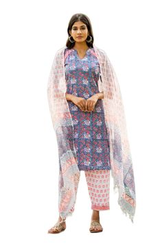 "Fall in love with yourself all over again with our floral hand block print cotton suit set. The intricate floral pattern, deep v collar neck and a contrasting white pants with block print patches makes up the overall look. Detail: This is 3 Pc. Set Suit set : cotton hand block printed suit set  Color :  Blue & peach Composition : 100%  Cotton (Premium quality) Length : 42 Inches (Kurta).  35 Inches (Pants) Wash care :  Hand wash separately in cold water. Do not soak and scrub. Dry in shade Model Size - Model (5'9\") is wearing size S" V Collar Neck, Hand Block Printed Suits, Fall In Love With Yourself, Printed Suit, Collar Neck, Blue Peach, Hand Block Print, Suit Set, White Pants