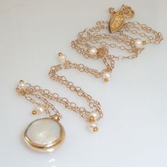 Pearl Long Necklace Wedding jewelry June by inbalmishan on Etsy Round Pearl Wedding Jewelry, Pearl Bridal Necklace Gift, Gold Pearl Necklace With Jewels, Pearl Pendant Bridal Necklace For Anniversary, Gold Pearl Drop Necklace For Wedding, Delicate Gold Pearl Necklace For Wedding, Gold Pearl Embellished Necklaces For Wedding, Gold Necklace With Pearl Drop For Wedding, Pearl White Round Bridal Necklace