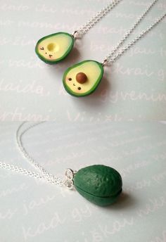 two necklaces made to look like avocado halves