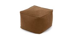 a small square footstool in grey suede leather with an inner cushion for storage