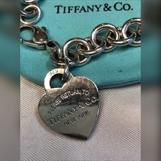 Tiffany Rtt Heart Tag Bracelet 925 Euc Get Your Bracelet, The Classic Heart Rtt Bracelet Is Ready To Be With A New Owner. Pre-Loved, But In Great Condition. Reasonable Offers Welcomed, But May Not Include Tiffany Box And/Or Pouch Depending On Offer. Luxury Sterling Silver Heart Bracelet For Gift, Classic Sterling Silver Bracelet With Charms, Luxury Sterling Silver Bracelets For Valentine's Day, Luxury Sterling Silver Heart Bracelet For Anniversary, Luxury Silver Bracelets For Valentine's Day, Luxury White Gold Heart Bracelet, Luxury White Gold Bracelet With Heart Charm, Luxury Sterling Silver Heart Bracelet For Valentine's Day, Classic Sterling Silver Charm Bracelet With Heart