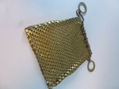 Up For Sale  Vintage Retro Evening Bag 1950s Gold Mesh Handbag Purse Please refer to pictures to see actual condition. please look at the pictures for state and size  WORLDWIDE FLAT SHIPPING WITH TRACKING #  PLEASE VISIT MY STORE FOR MORE VINTAGE ITEMS Vintage Square Evening Bag, Vintage Square Party Bag, Vintage Square Party Bags, Vintage Gold Pouch Shoulder Bag, Vintage Gold Bag For Travel, Vintage Gold Shoulder Bag, Vintage Gold Travel Bag, Vintage Square Bags, Handbag Purse