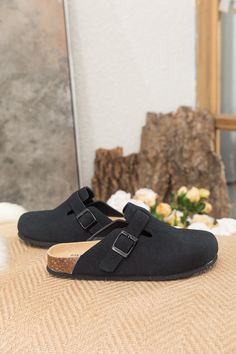 Exude casual-cool style in comfort in these slip-on-and-go clogs, crafted from a soft suede in a versatile neutral hue for effortless pairing. A durable TPU sole ensures tread-safe steps. Suede upper Man-made leather lining Man-made insole TPU sole Casual Slip-on Slippers With Buckle Closure, Casual Closed Toe Clogs With Cork-bed Midsoles, Casual Black Mules With Cork-bed Midsoles, Casual Clogs With Cork-bed Midsoles, Casual Flat Clogs With Leather Footbed, Casual Closed Toe Clogs With Textured Footbed, Casual Suede Mules With Cork-bed Midsoles, Black Slip-on Clogs With Textured Footbed, Black Textured Footbed Slip-on Clogs