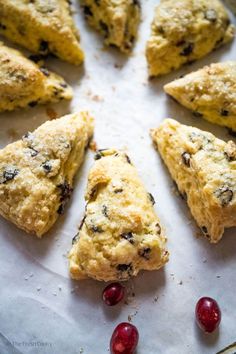 several scones with cranberries are arranged in a circle